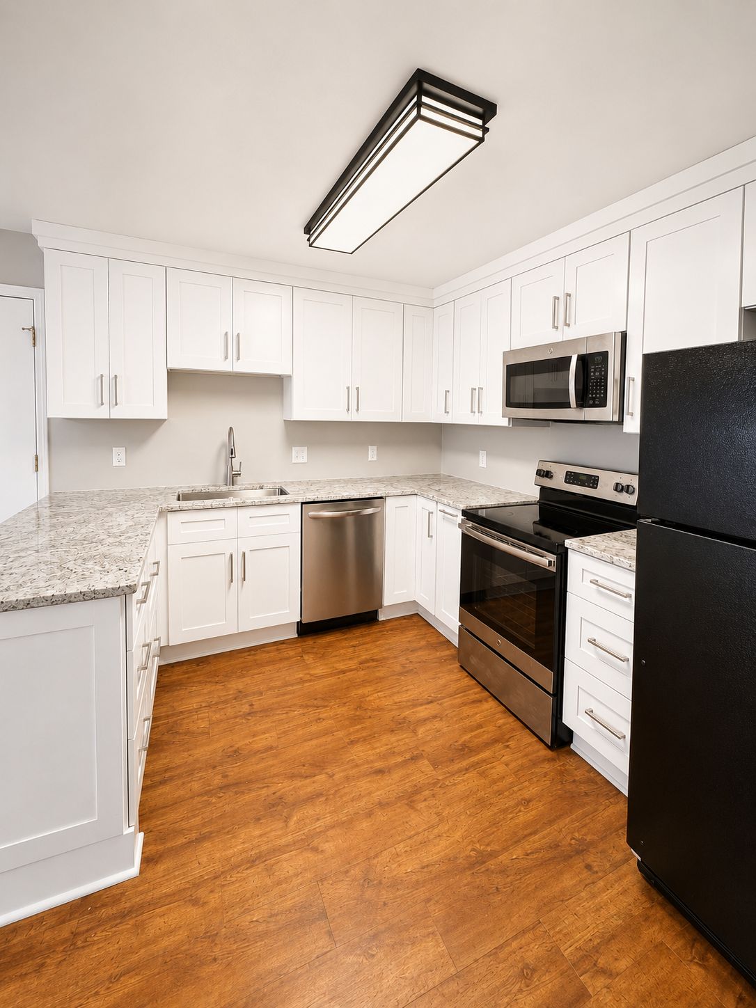 kitchen remodel Brentwood Tennessee white shaker cabinets granite countertops